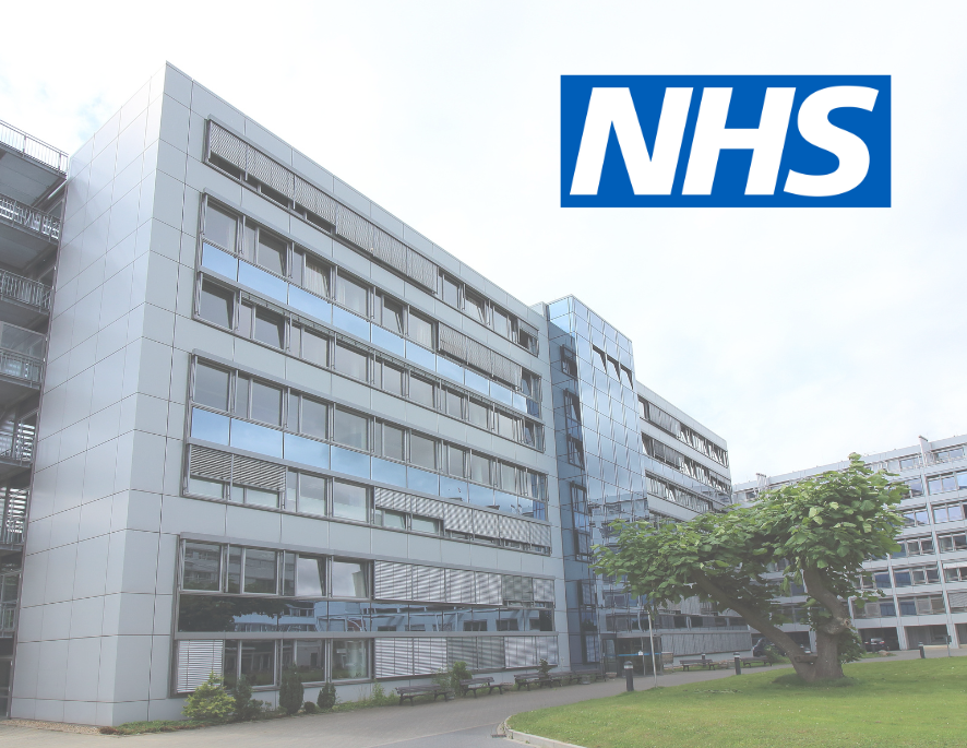 Photo of a hospital with the NHS logo